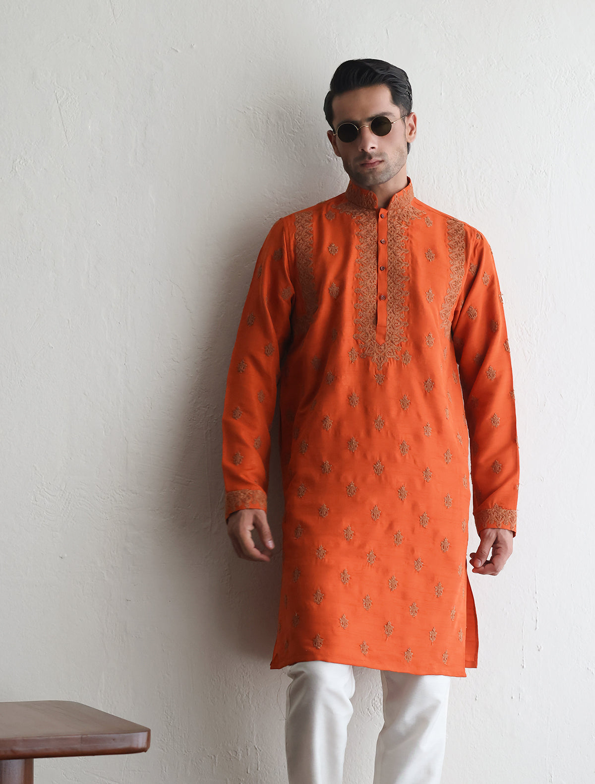 Orange embroidered kurta with heavy embellishment